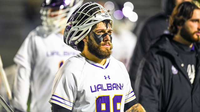 Albany men's lacrosse player Jake Piseno pictured with his helmet lifted after a game earlier this season against Bryant